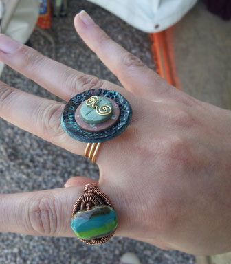 Eva Sherman's Wire Wrapped Ring and Meredith Arnold's Polymer Clay Ring, taught in class at Tucson